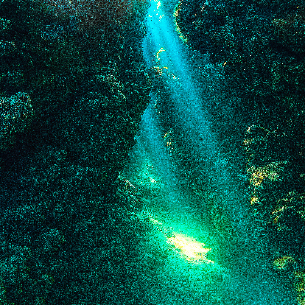 Reef cave light beams